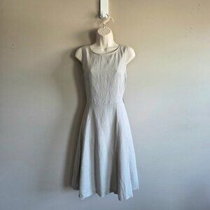 Bedo midi neutral color sleeveless dress.